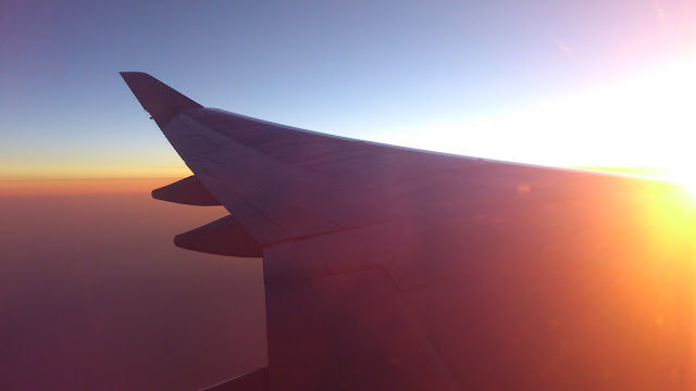 Sunrise over a wing
